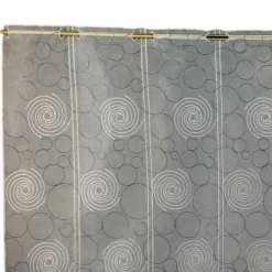 Brise-bise brodé à motifs spirales et cercles