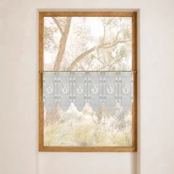 Brise-bise brodé à motifs théières