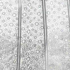 Brise-bise en maille aux cercles ajourés