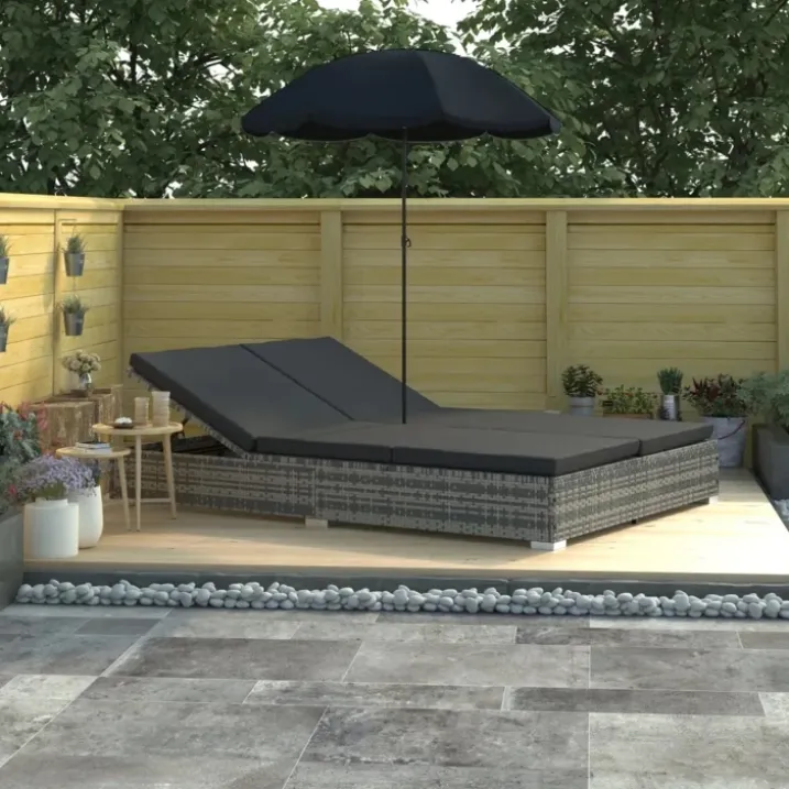 Chaise longue de jardin avec parasol