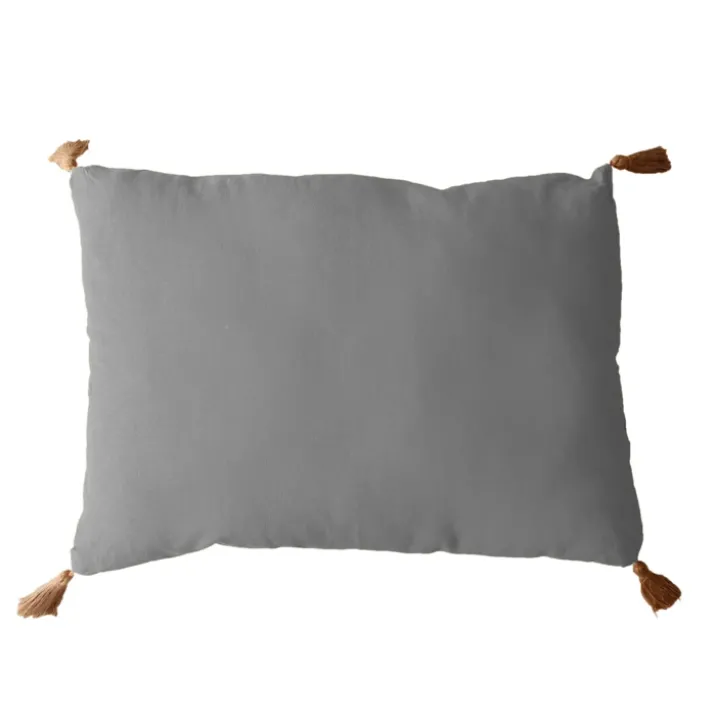 Coussin avec pompons en jute