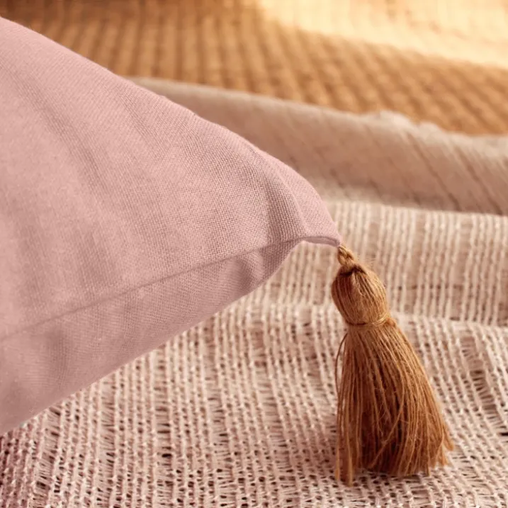 Coussin avec pompons en jute