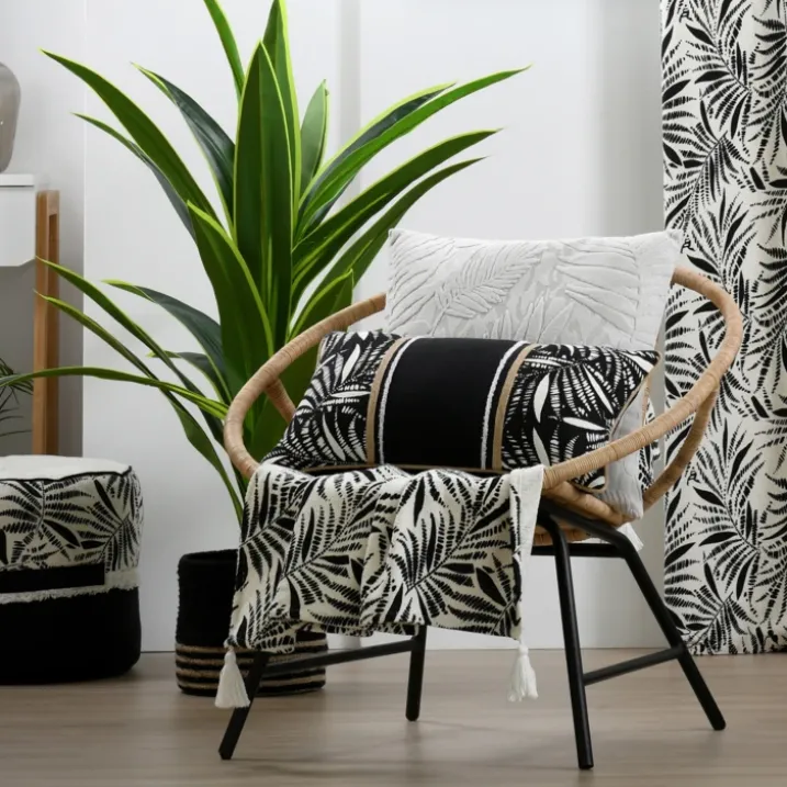 Coussin carré effet velours avec motif en relief tropical