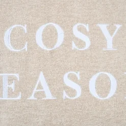 Coussin décoratif avec message brodé