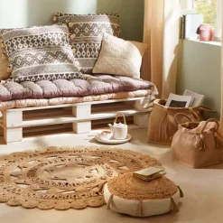 Coussin de sol en jute et pompons