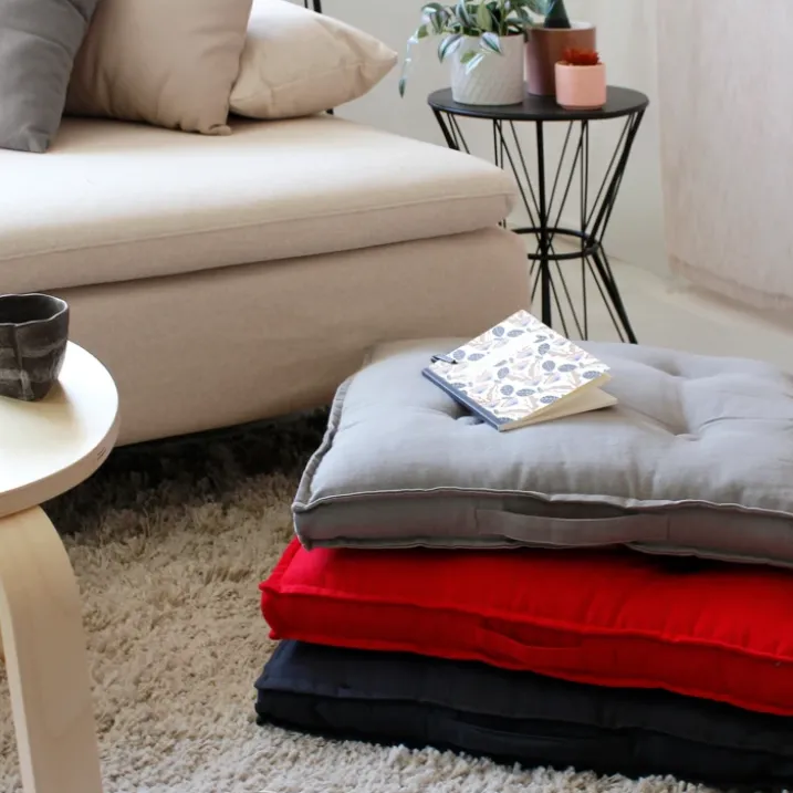 Coussin de sol uni en pur coton