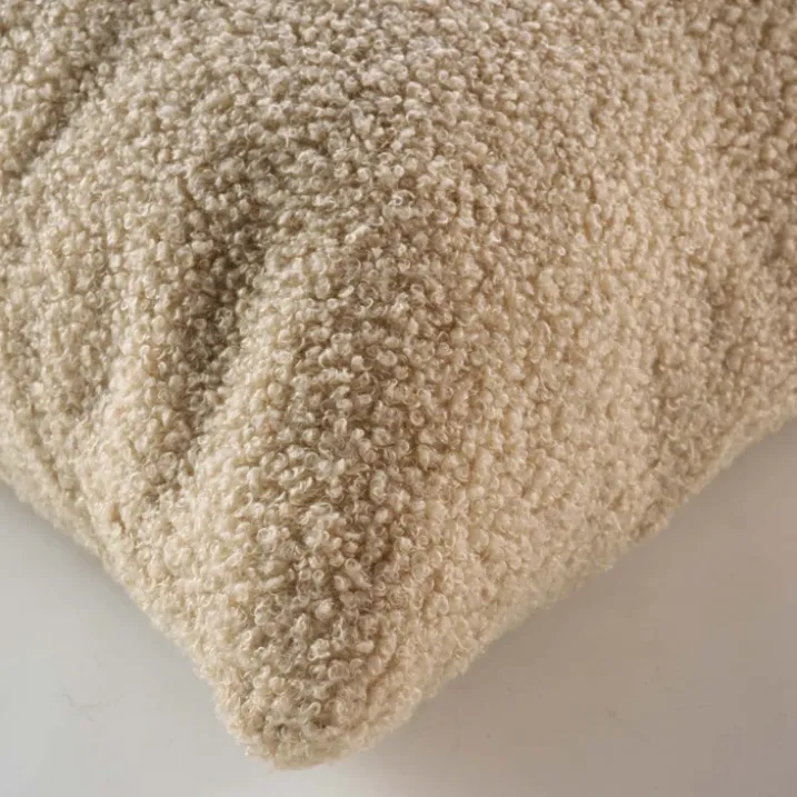 Coussin déhoussable en bouclette unie