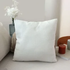 Coussin déhoussable en velours chenillé