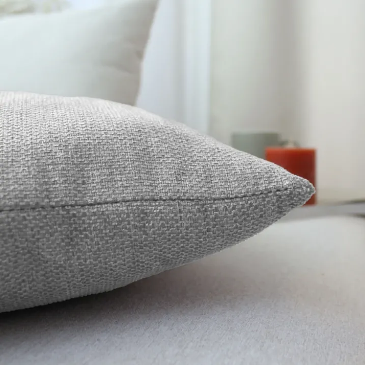 Coussin déhoussable en velours chenillé