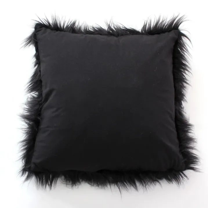 Coussin déhoussable uni imitation fourrure