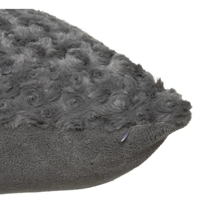 Coussin en imitation fourrure bouclée