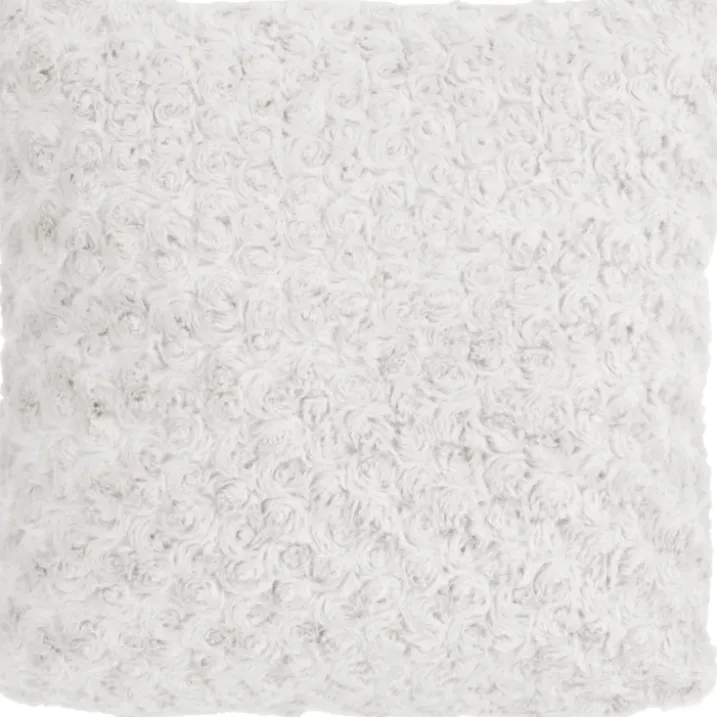 Coussin en imitation fourrure bouclée