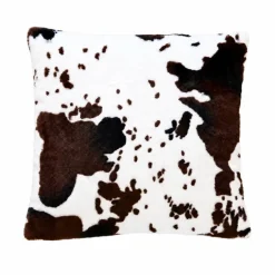 Coussin garni à motif peau de vache et dos en velours