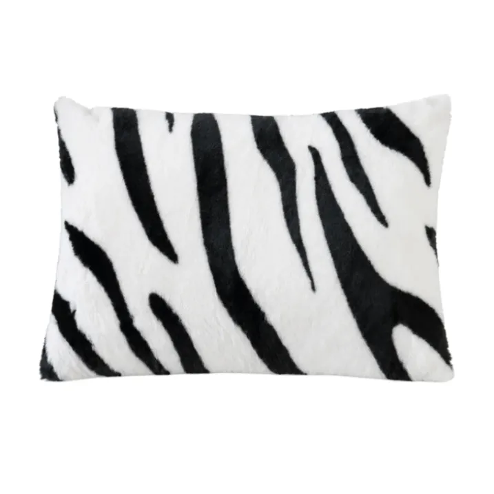 Coussin garni à motif zèbre avec dos en velours