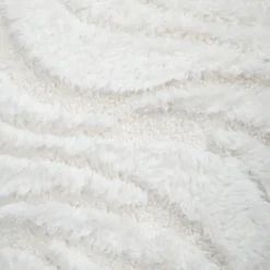 Coussin imitation fourrure vagues