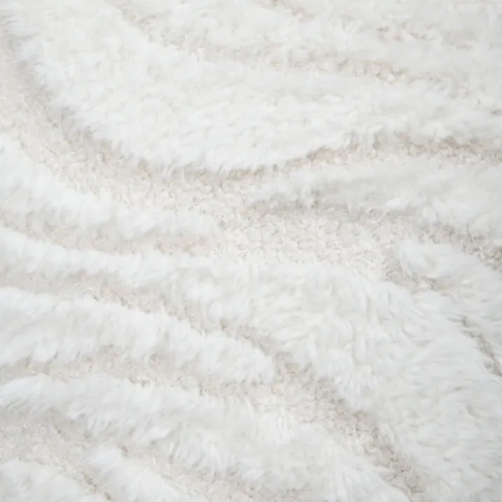 Coussin imitation fourrure vagues