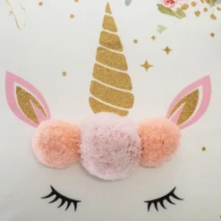 Coussin licorne à pompons