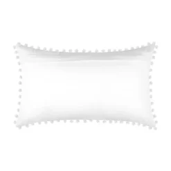 Coussin rectangulaire en coton déhoussable à pompons