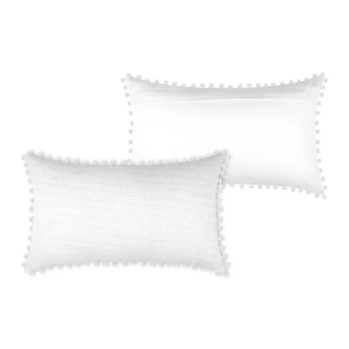 Coussin rectangulaire en coton déhoussable à pompons