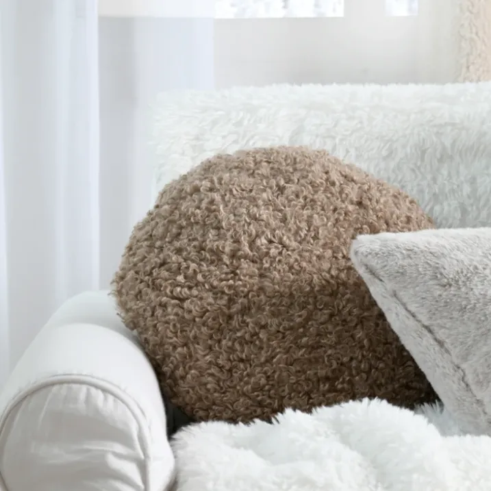 Coussin rond bouclette doudou