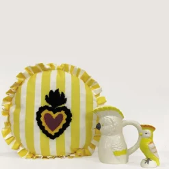 Coussin rond à rayures avec motif cœur brodé