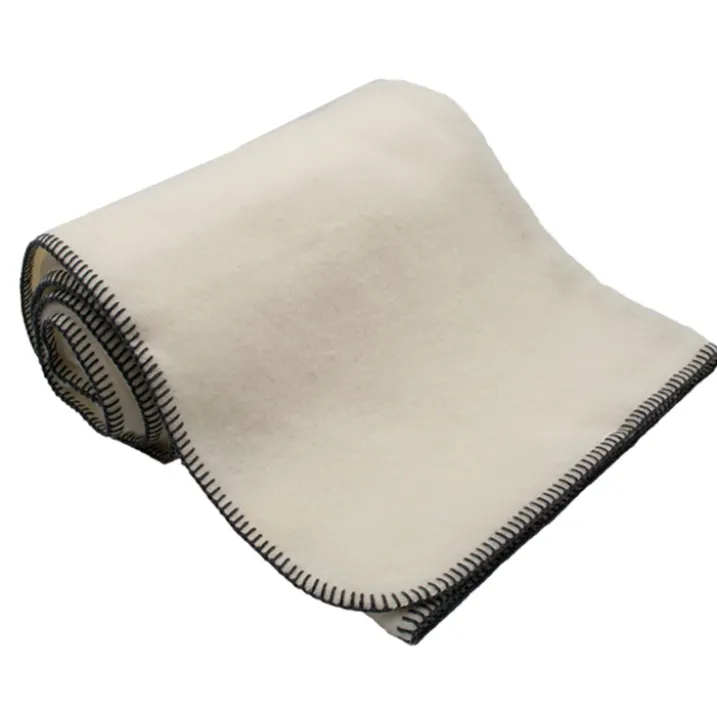 Couverture pure laine vierge naturelle finition point de cheval