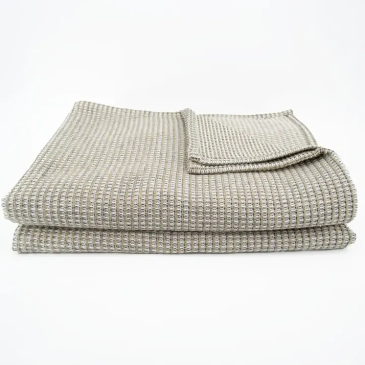 Dessus de lit tissé en coton recyclé motif nid d’abeille