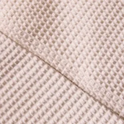 Dessus de lit tissé en coton recyclé motif nid d’abeille