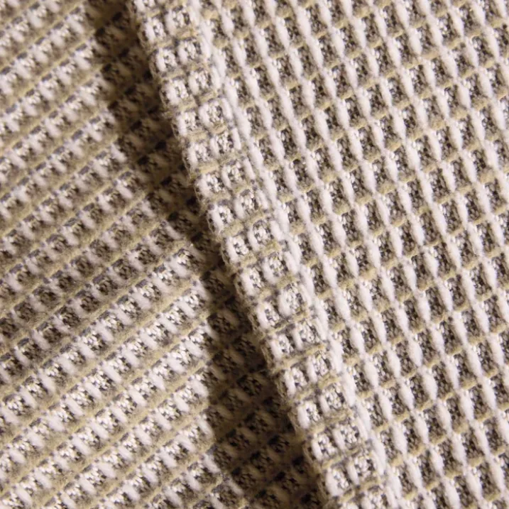 Dessus de lit tissé en coton recyclé motif nid d’abeille