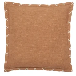 Housse de coussin brodée avec motifs en croix