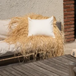 Housse de coussin déco avec franges en raphia