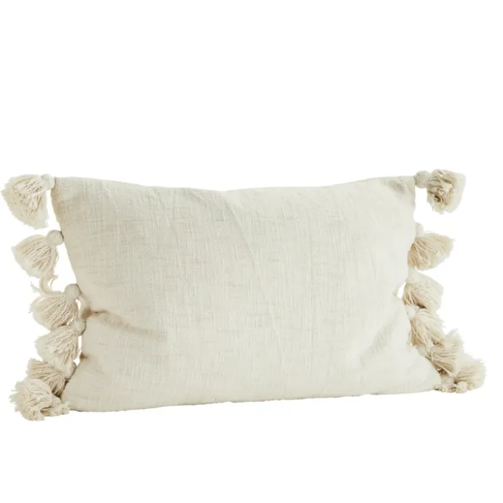 Housse de coussin en coton avec pompons
