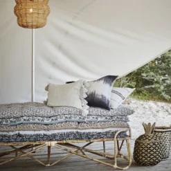 Housse de coussin en coton avec pompons