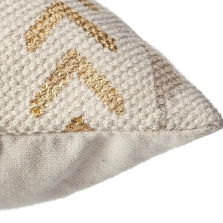 Housse de coussin ethnique et or