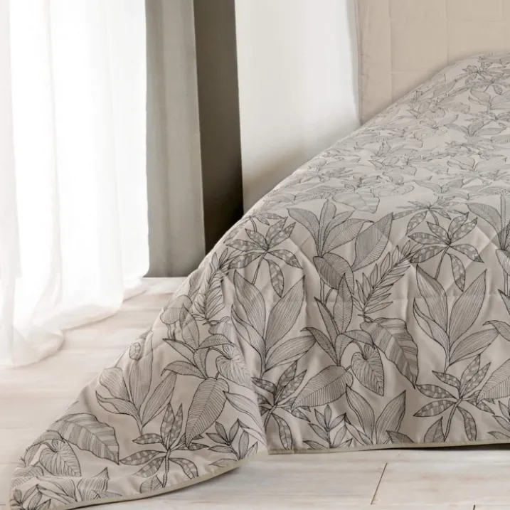 Jeté de lit aux feuilles stylisées