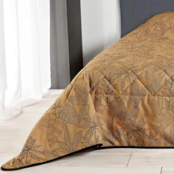 Jeté de lit aux feuilles stylisées