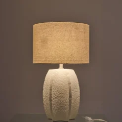 Lampe à poser en poterie avec pied sculpté