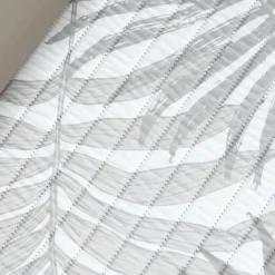 Matelas de plage avec repose-tête feuillage