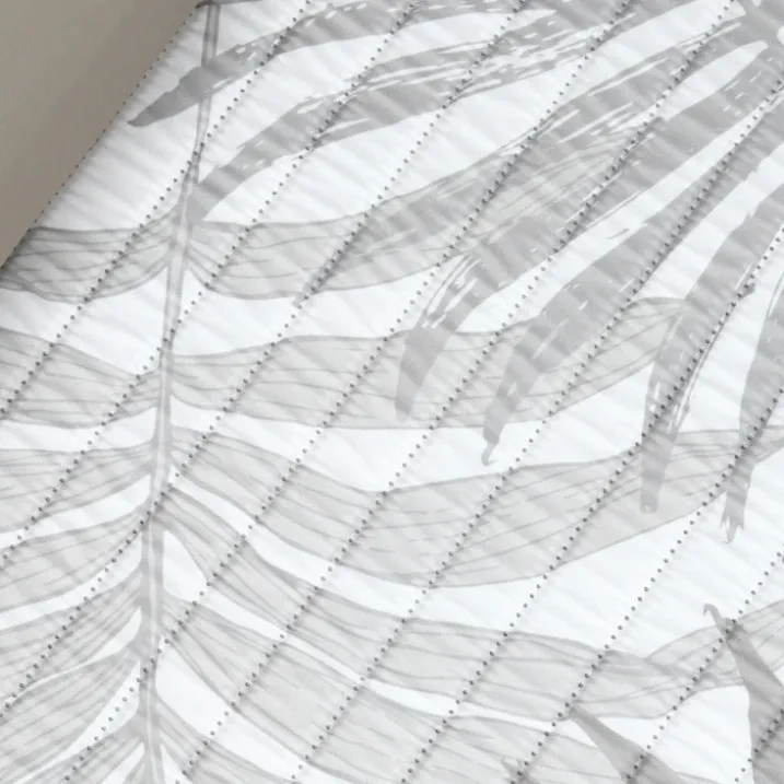 Matelas de plage avec repose-tête feuillage