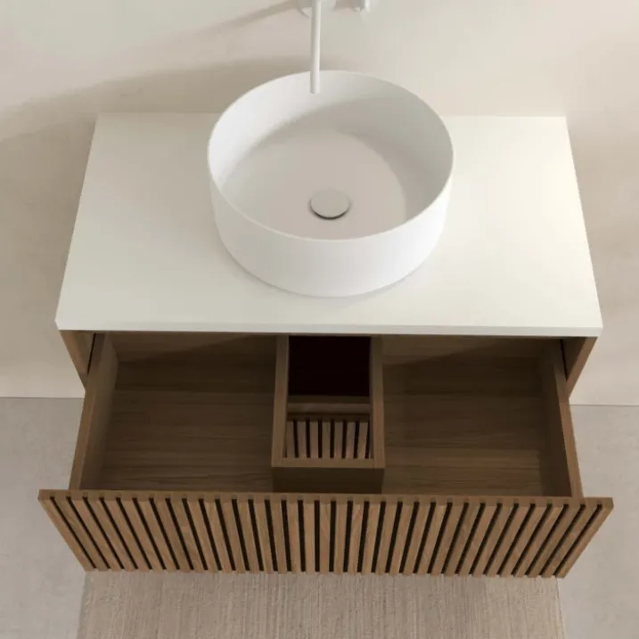 Meuble de salle de bain suspendu avec façade crantée, vasque(s) ronde(s) et miroir(s) ovales