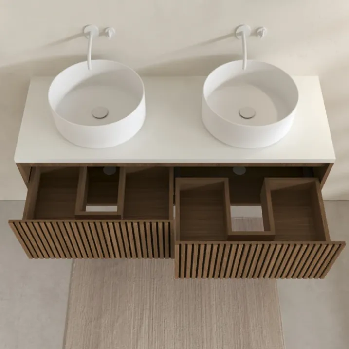 Meuble de salle de bain suspendu avec façade crantée, plan de toilette et vasque(s) à poser