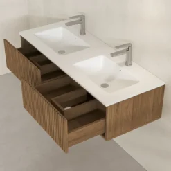 Meuble de salle de bain suspendu avec façade crantée et vasque encastrée