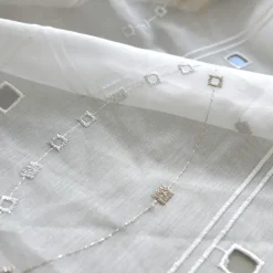 Modulable aux broderies de vagues