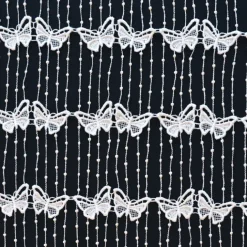 Modulable en macramé papillon