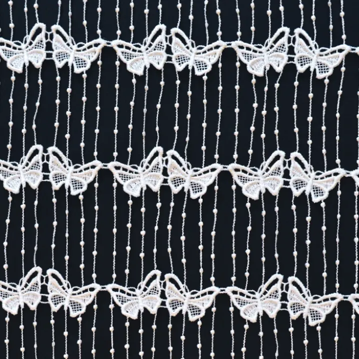 Modulable en macramé papillon