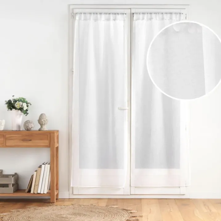 Paire de voilages passe-tringle en voile sablé avec finitions pompons