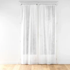 Paire de voilages passe-tringle en voile tissé motif feuillage