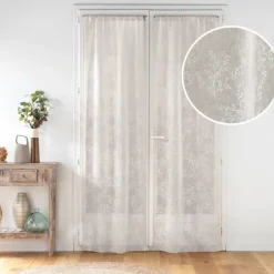 Paire de voilages passe-tringle en voile tissé motif feuillage