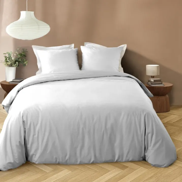 Parure de lit 3 pièces en microfibre unie lavée housse + taies
