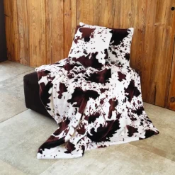 Plaid doux à motif peau de vache avec dos en velours